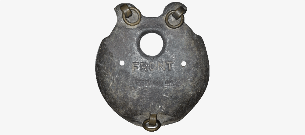 Image of flat round grey object with hole.
