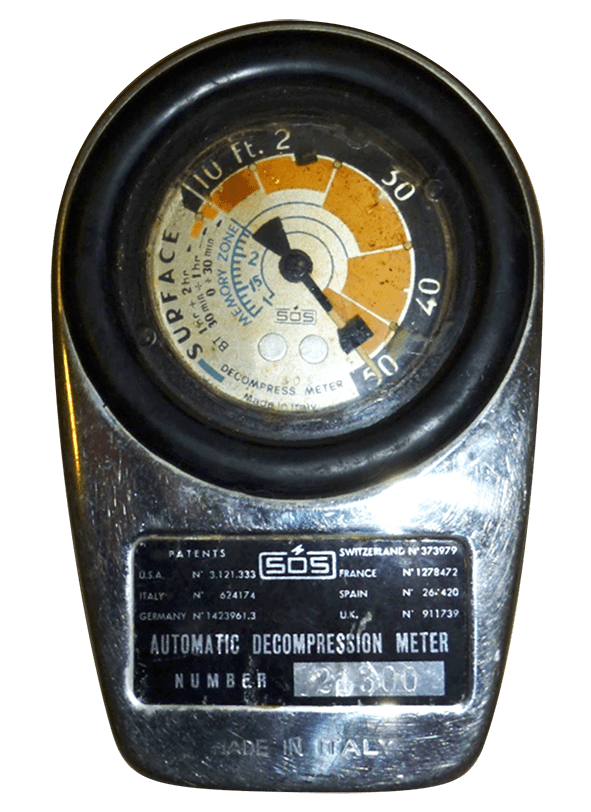 Hand-sized diving computer in chromed case with large circular dial at the top