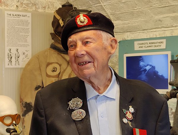 Head and shoulders photo of Jack Quinn smiling and looking slightly to his right.